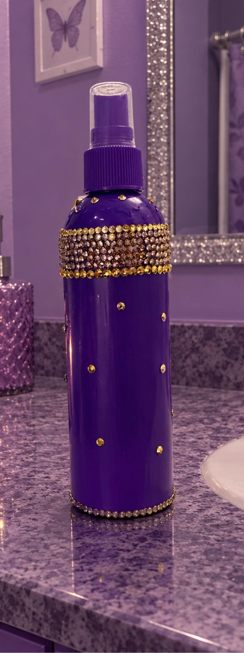 Purple decorative spray bottle